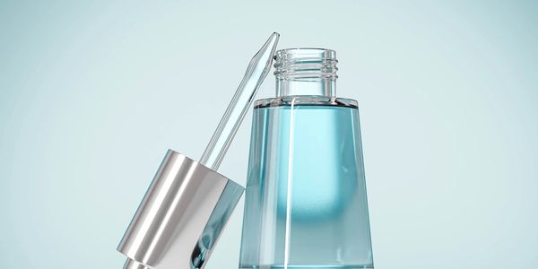 Fancy blue bottle with atomizer top