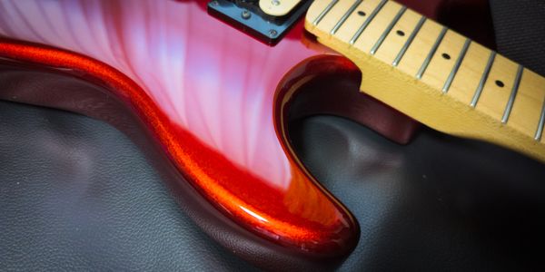 metallic red custom guitar paint design