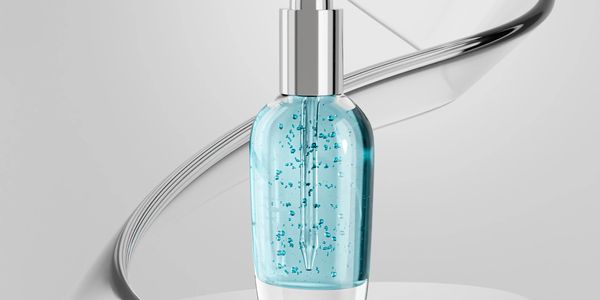 Blue glass spray atomizer bottle.