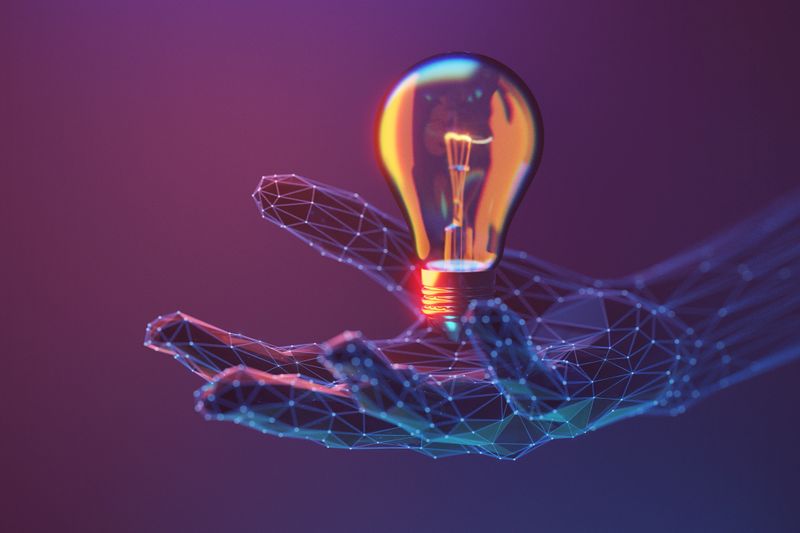 A digital representation of a hand holding a glowing light bulb, symbolizing ideas, innovation, and technology in futuristic style.