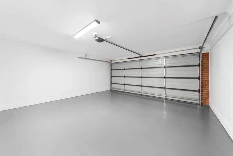 Epoxy garage floor installation in a modern home.
