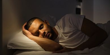 Person sleeping peacefully, representing sleep focused psychology, evidence-based insomnia treatment