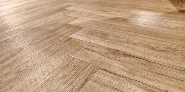 Finished flooring shown as part of a completed carpentry project.