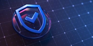 Blue shield with checkmark symbolizing security on digital grid background.