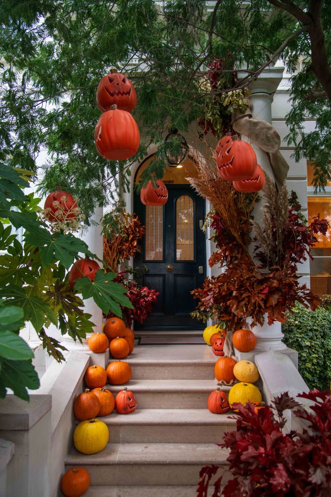 Halloween decorations with pumpkins and jack-o'-lanterns.