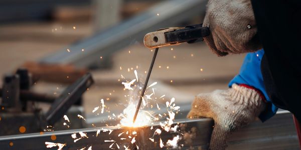 Custom fabrication welds on construction site by Midwest Metalworks