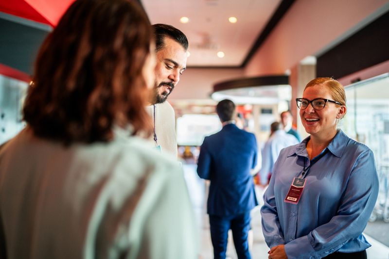 Business people talking during business seminar