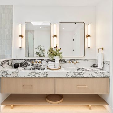 Double-sink vanity and LED lighting installation during a Tampa Bay bathroom renovation.