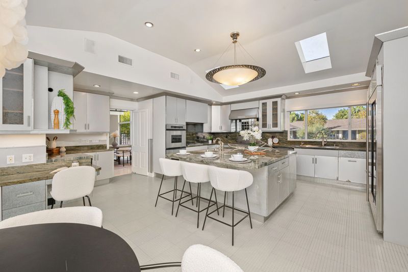 Modern kitchen remodel featuring sleek cabinetry and a spacious island.