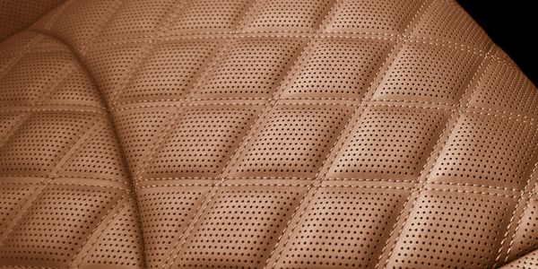 Quilted tan leather interior, luxury car interior