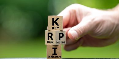 Hand stacking KPI blocks.