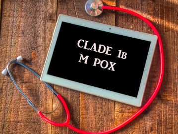 Tablet displaying 'Clade 1B M Pox' with a stethoscope.