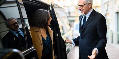 Suv transports person to an event