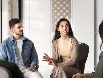 Business team attending motivational workshop to build resilience and growth mindset.