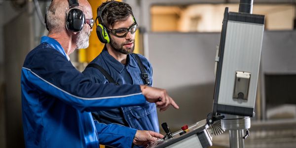Workers with ear protection. Make America safe. National security. 