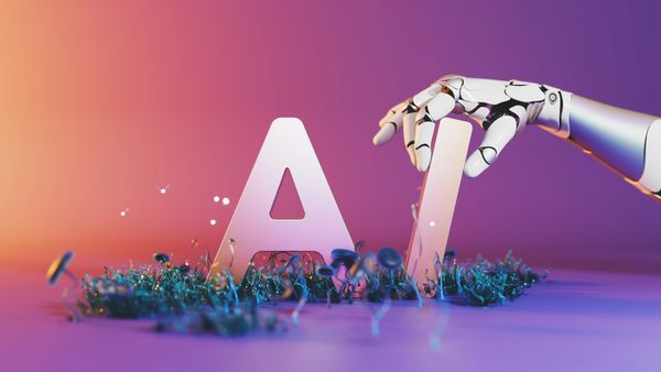A robotic hand placing the letter 'I' next to 'A', forming 'AI'.