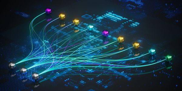 Colorful digital network connections on a dark tech circuit board.