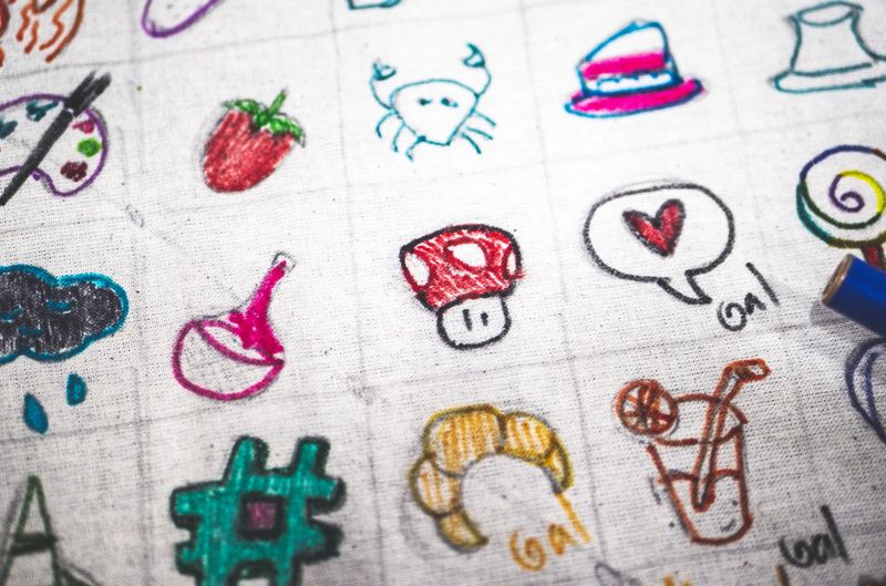 People drawing cartoons doodles colourful art expressions in New zealand