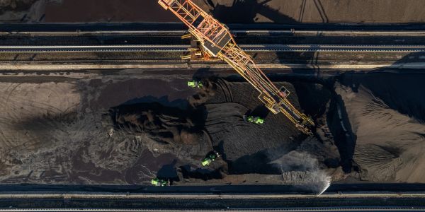 Aerial view of coal transport and machines in operation.