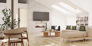 Bright and modern living room with skylights and minimalist decor.