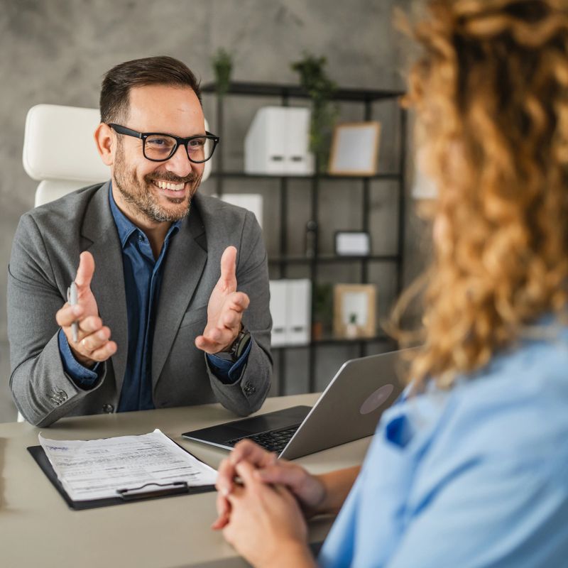 adult man businessman manager explain and present job to adult woman on job interview