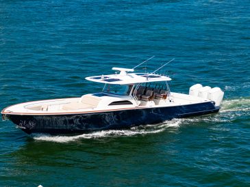 Luxury motorboat cruising on the water.