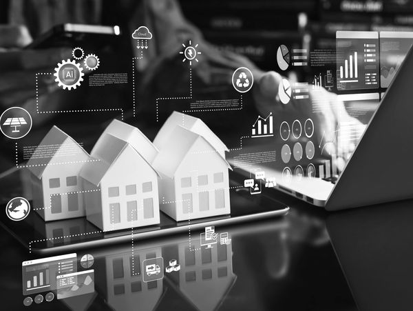 Smart home technology and data analytics visualization with laptop.