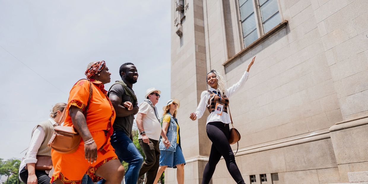 Group of tourists on a walking tour in a city scape