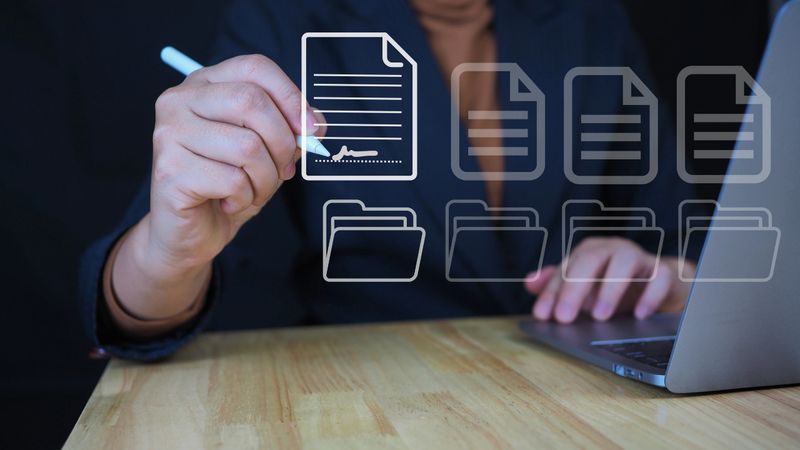 Digital Document Management System for Business,glowing electronic document files and digital signature.