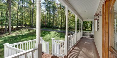 Peaceful lakeside dock with wildflowers in Prosperity SC - waterfront and rural homes for sale near 