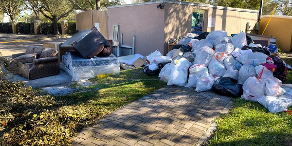 Image of trash and old furniture. Contact us for junk removal in NE WI.