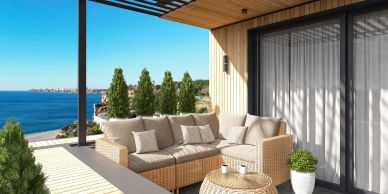 Cozy outdoor seating area with sea view.