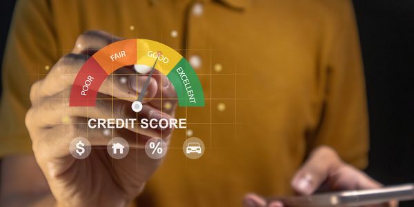 Person checking a credit score gauge on a virtual interface.