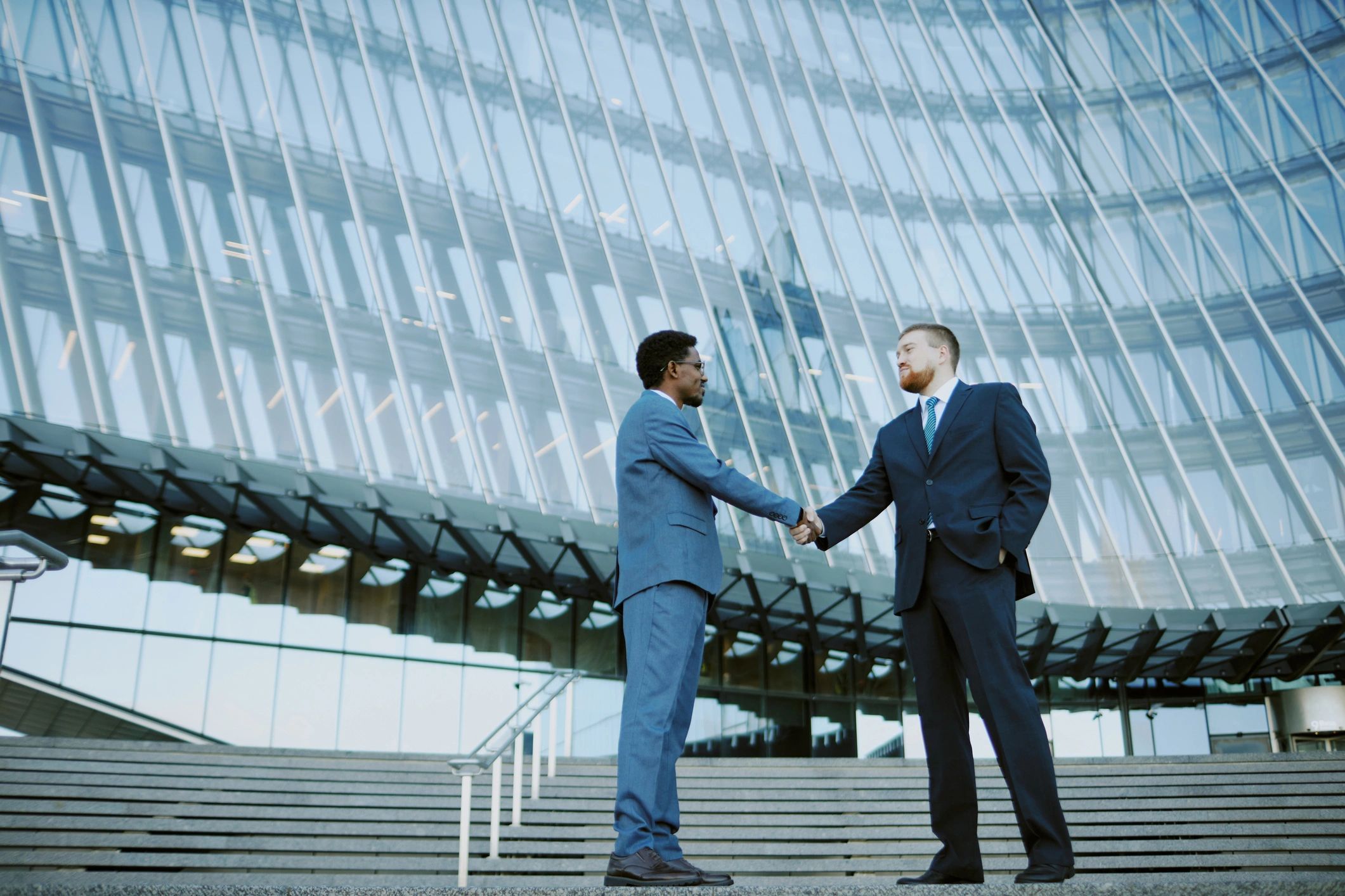 Two business men shaking hands 
