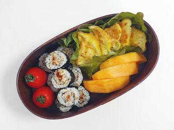Shrimp Tempura and Cucumber Inside, Topped with Eel, Avocado, and Eel Sauce.
