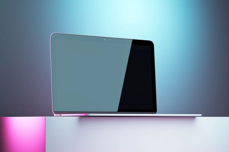 Modern laptop with a clean design on a stand, isolated against a gradient blue and pink background in a studio. Concept of technology and luxury. 3D Rendering.