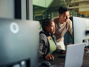 Close-up of video and audio cables connected to a device.