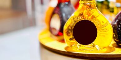 Honey jars displayed on a wooden surface.