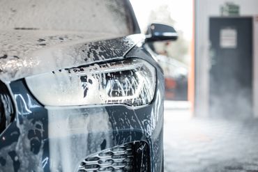 Detailed view of pristine black vehicle.