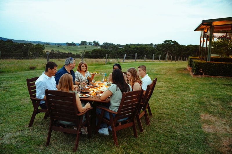 Friends and family at barbecue in early summertime