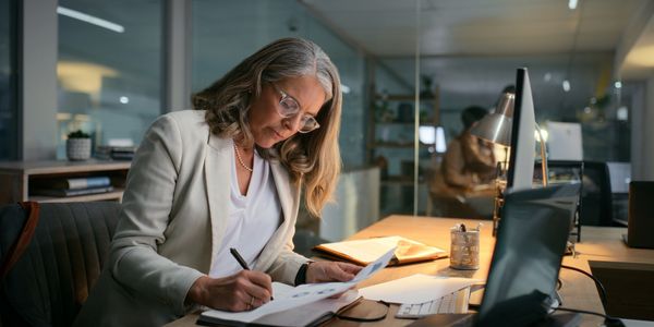 Tax professional reviewing documents.
