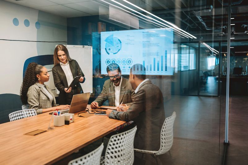 Business woman leading meeting