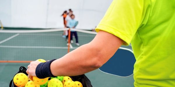 Gen X players enjoying a lively pickleball match.