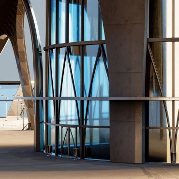 Modern building with blue glass and metal arches.