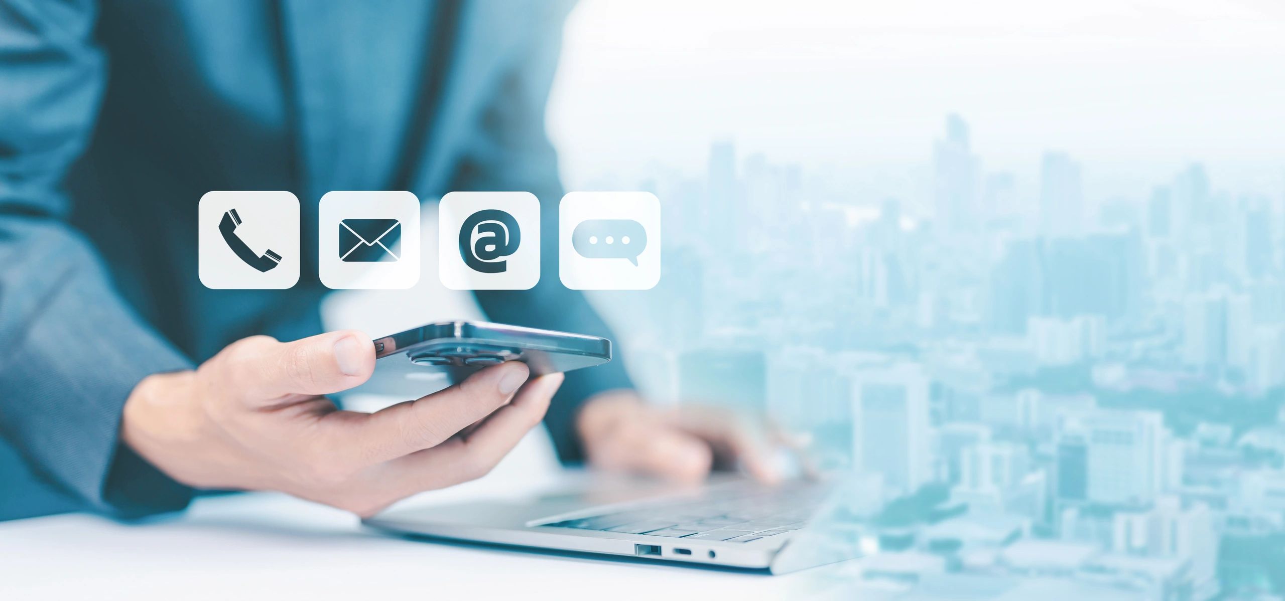 Businessman using smartphone with communication icons overlay.