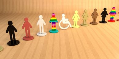 Small figures showing diversity including race, gender, sexuality and mixed abilities. 