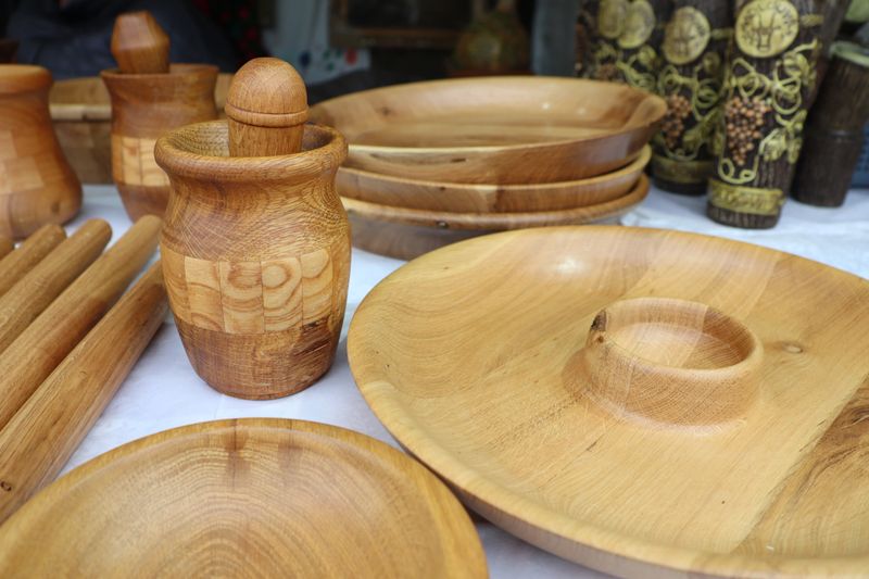 Beautifully crafted wooden bowls, exquisite containers, and functional utensils for rustic dining aesthetics and charm