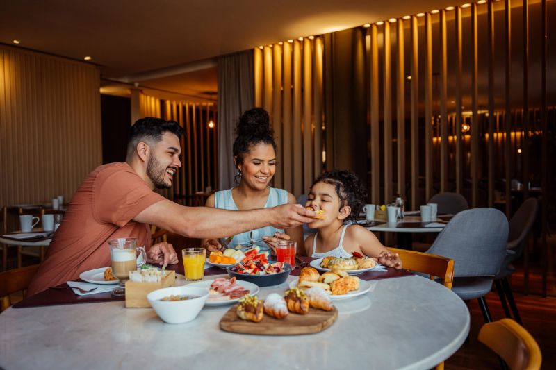 Family having breakfast in hotel