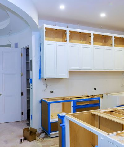 ustom built-in cabinetry finished with Milesi wood coatings and arched shelving.