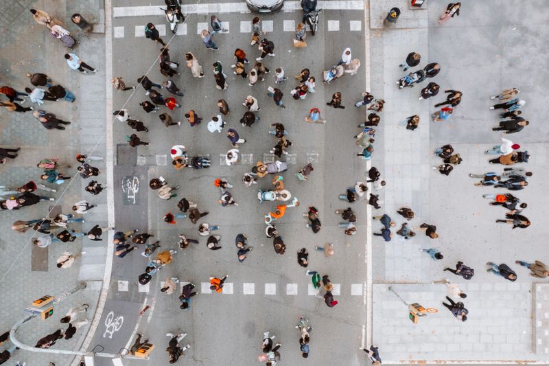 Pedestrian crowd crossing crosswalk, top view